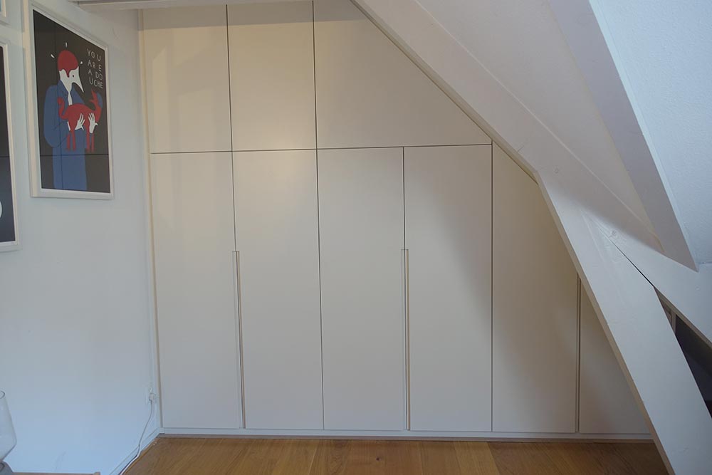 Wardrobes angled high ceiling